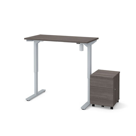 BESTAR Universel 2-piece set including a 24" x 48" standing desk and a mobile pedestal in bark grey